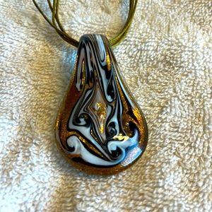 One of a kind blown glass, gold, white and brown pendant.